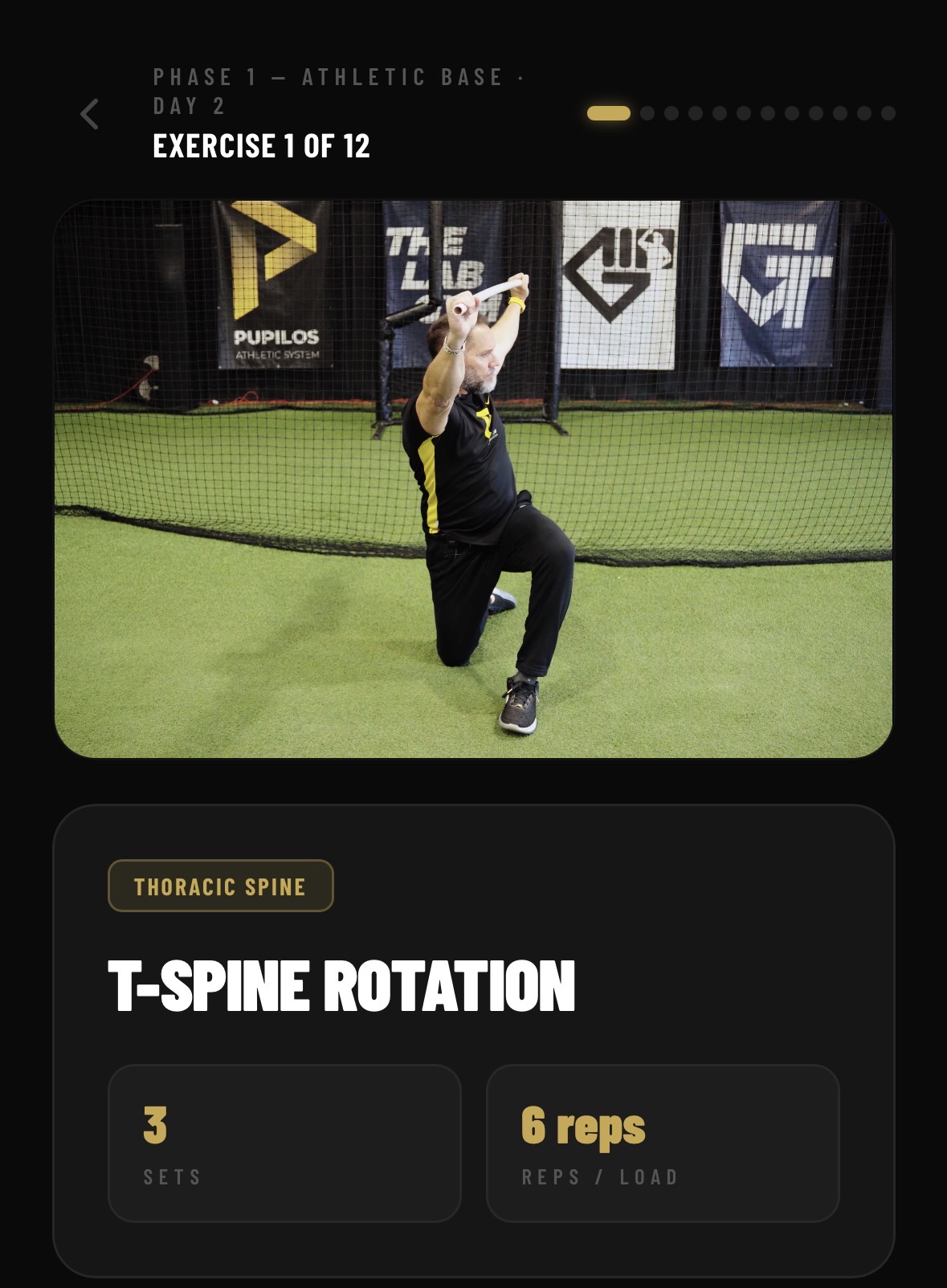 Pupilo workout screen — T-Spine Rotation exercise with video